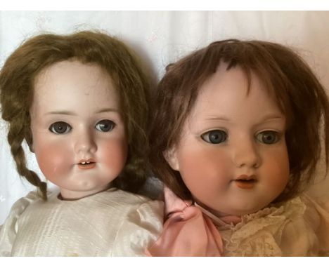 Large Antique dolls ; Armand Marseille A12M large bisque head doll on Articulated original body , and a Schoennau and Hoffmei