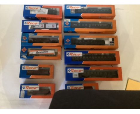 ROCO vintage railway train interest ; 12 boxed carriages and wagons VGC within dusty boxes as shown( quantity)