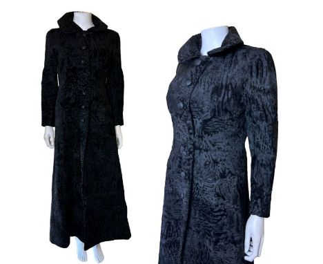 A unique and superior quality 1970s broad tail lamb maxi coat with silk lining by Maxwell croft of London. decorative silk co