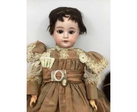 Antique doll ; Armand Marseille AM 8 DEP 1894 Large 23” Bisque head doll on articulated jointed body, dark glass eyes, has or