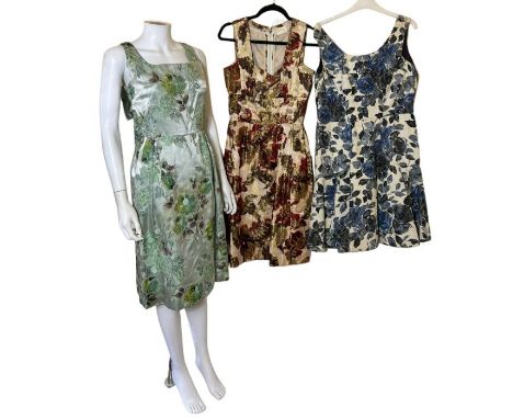 four vintage dresses to include 1 50s/60s in a green rose motif brocade with twinkling iridescent cellophane accents and a wa