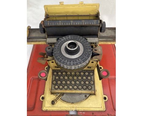 Junior Typewriter with metal case, made in Germany by Gebruder Schmidt, c1930. Appears in good condition, will require new ri