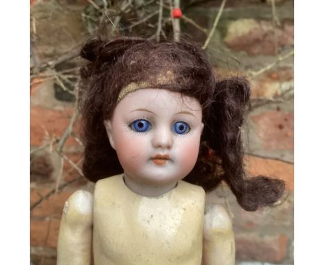 Antique Simon &amp; Halbig Miniature small 9” doll on original body with original wig (One foot appears repaired or painted o