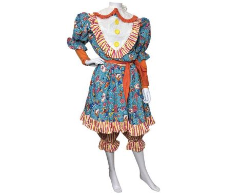 Three vintage clowns costumes, one is labelled Costumes by Betty. The dresses are made from brightly printed cotton. costumes