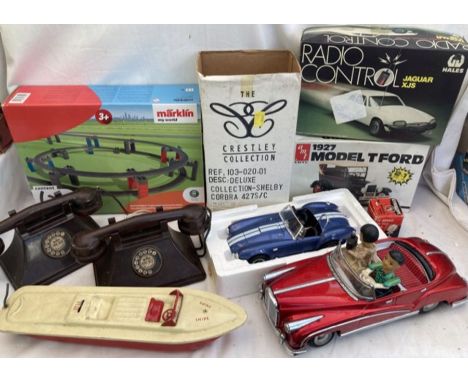 Vintage Bakelite Telephones by Kay, Marklin elevated railroad, Crestley due cast AC Cobra, Sebel (Mobo) snipe speedboat, batt
