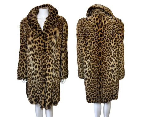 A vintage 1960s leopard skin coat with self lined collar, two concealed set in pockets and a fur lining at each wrist so that