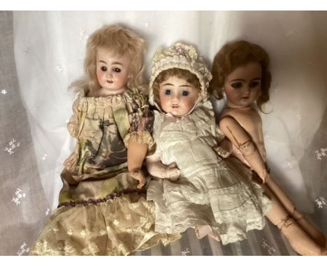 Antique dolls x 3 to include a 14” Kid bodied shoulder head ( 2 fingers missing)with blonde wig and dark brown eyes ; Simon &