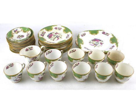 A J&G Grovenor 'Ye Old English' tea service for ten. Including two sandwich plates, saucers, etc. Max. H9cm