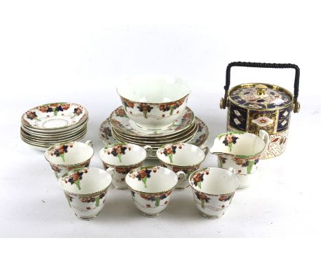 A Royal Staffordshire six piece tea service and an Imari biscuit barrel. The tea service decorated with flowers and foliage, 