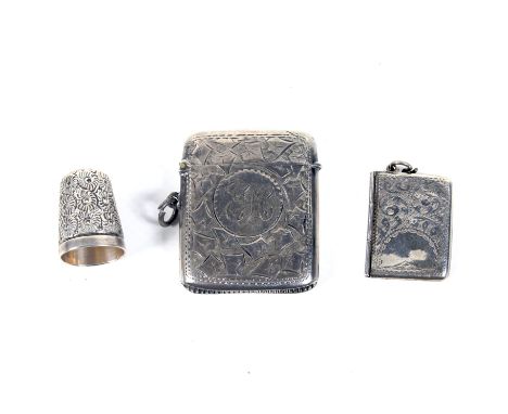 A late Victorian/Edwardian silver vesta/match case and other items. The vesta engraved with ivy leaves around a round reserve