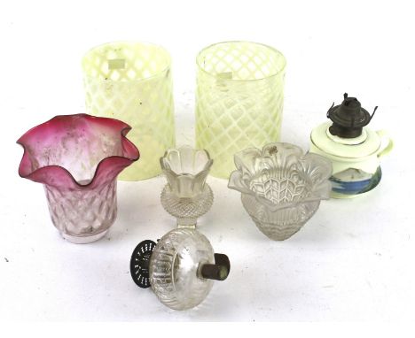 A pair of vintage glass light shades and oil lamp components. The pair of shades yellow in colour with chequered pattern, H16