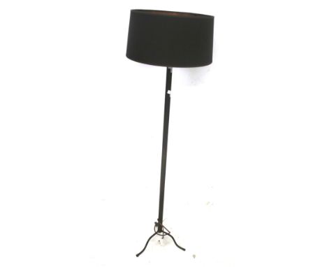 A standard lamp with a tripod base. H124cm