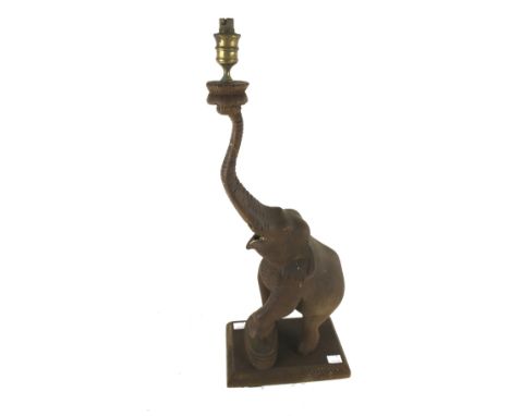 A vintage wooden elephant table lamp. H52cm