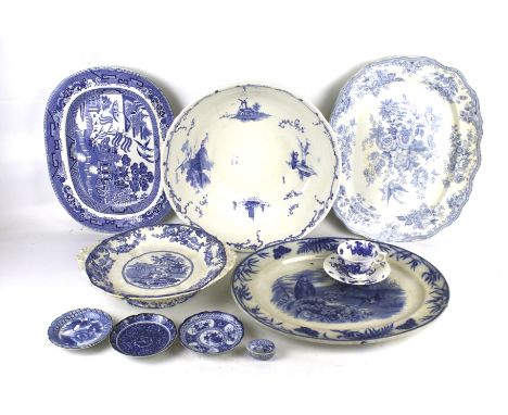 An assortment of blue and white ceramics. Including a Royal Worcester teacup and saucer, Delft bowl, Cyprus platter, etc.