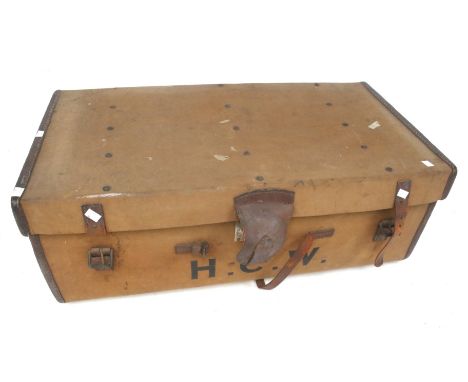 A vintage canvas and leather bound travel trunk and contents. L92cm x D50cm x H34cm