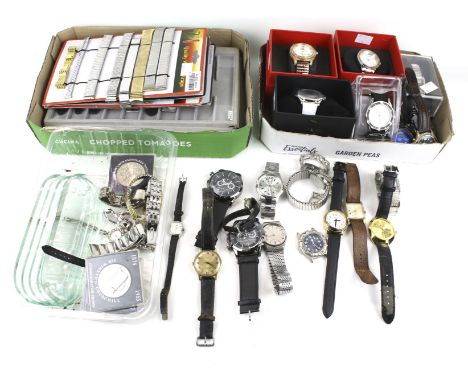 A collection of approximately 30 miscellaneous designer wrist and bracelet watches, straps and other items. The lady's and ge