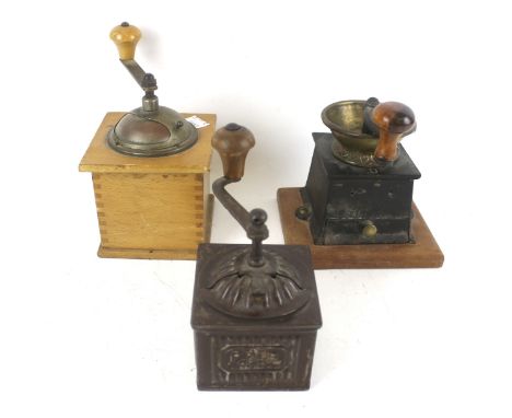 A collection of three assorted vintage hand coffee grinders. Max. H19cm