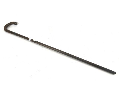 A vintage walking cane stick with a hallmarked silver collar. 91cm 