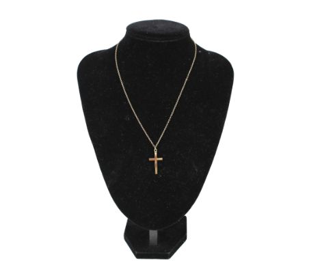 A vintage 9ct gold Latin cross and chain. The cross hallmarked Birmingham 1977; the belcher chain on a bolt-ring clasp stampe