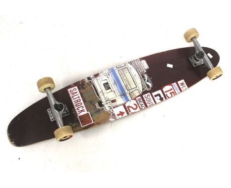 A vintage Longboard Saltrock skateboard. With printed decoration to the underside, L103cm