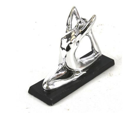 An Art Deco style figure of a woman. On plinth, H16cm