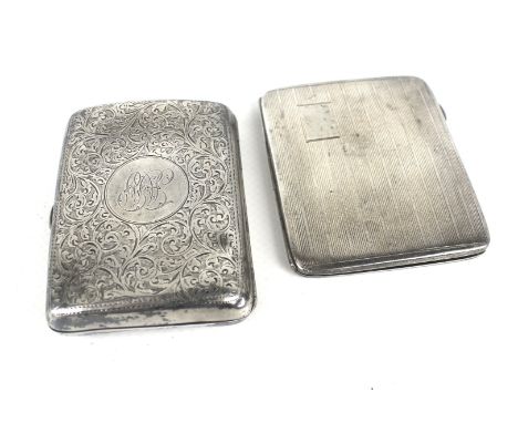 Two small rectangular cigarette cases. Comprising; an Edwardian concave example engraved all over with foliate foliate scroll