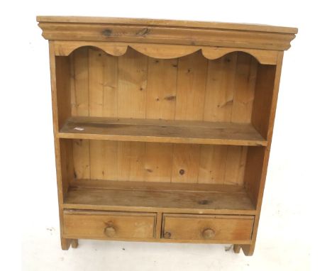 A pine wall shelf unit. With a single shelf positioned over two drawers. L63cm x D20cm x H77cm