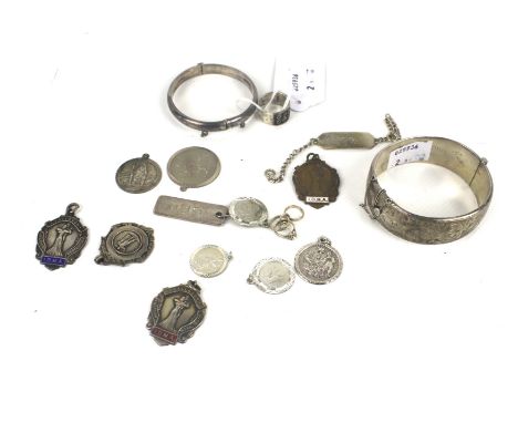 A silver broad hinged bangle and other items. The 21mm wide part foliate engraved hollow hinged bangle with hallmarks for Bir