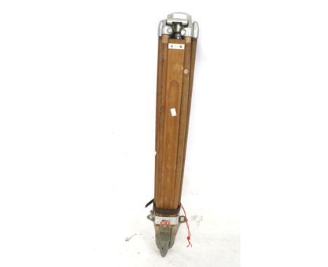 A vintage surveyor's wooden tripod. Kern Swiss 151-B, with metal points, 105cm closed.