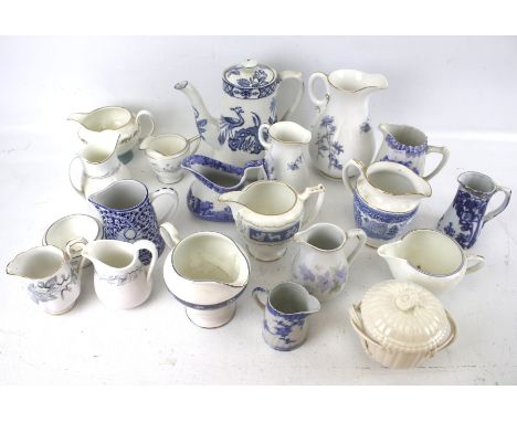 A collection of blue and white ceramic jugs. Including Spode, Royal Worcester, etc. Max. H18cm