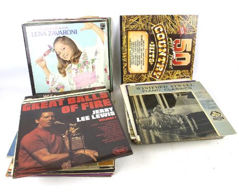 A large collection of LP vinyl and 78 RPM records. Including 'K-Tel's Country Comfort', '50 All Time County Hits', etc, the m
