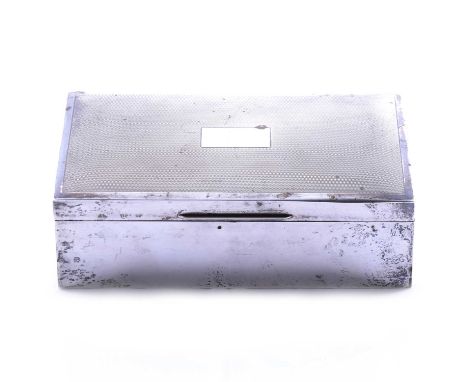 A silver cigarette / jewel box, Harman Brothers, Birmingham 1966, engine turned, vacant cartouche, wood-lined, 8.75x15.5cm.