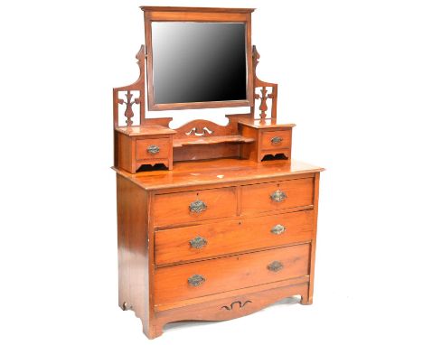 Victorian walnut dressing table, rectangular bevelled mirror above trinket drawers, the base with two short and two long draw