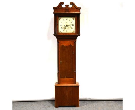 Oak longcase clock, the hood with swan neck pediment and fluted columns, trunk with long door, bracket feet, thirteen inch sq
