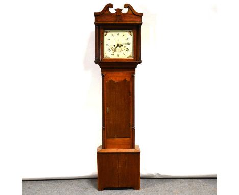 Oak longcase clock, the hood with swan neck pediment and fluted columns, trunk with long door, bracket feet, thirteen inch sq