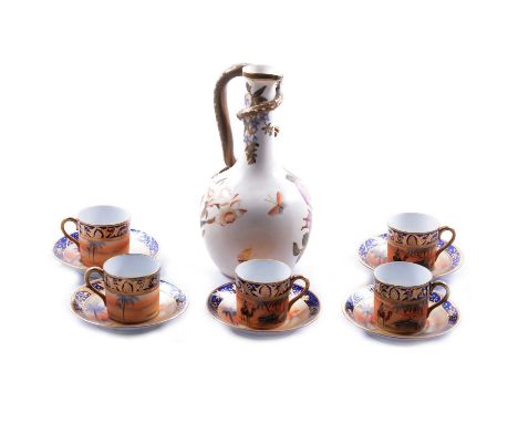 Royal Worcester ewer with Dragon handle, printed with flowers, 23cm; and five Noritake coffee cans and saucers, desert oasis 