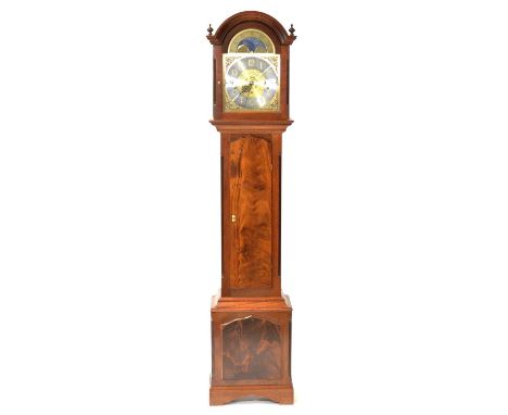 Modern mahogany eight-day clock, arched hood, long door, bracket feet, 28cm arched brass dial with moon phase, triple weight 