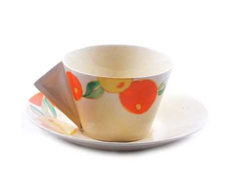 Clarice Cliff, a 'Citrus' pattern Conical shape tea cup and saucer, facsimile Wilkinson backstamp, saucer 15cm.