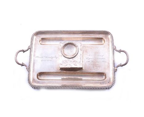 A silver twin-handled presentation desk tidy, Thomas Bradbury &amp; Sons, London 1904, rectangular form with central square c