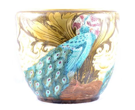 A Minton's Secessionist pottery jardiniere designed by John Wadsworth and Leon Solon, circa 1900, tubelined with peacocks, ol
