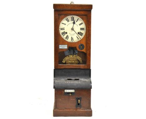 National Time Recorder clocking in clock, oak case, height 98cm.
