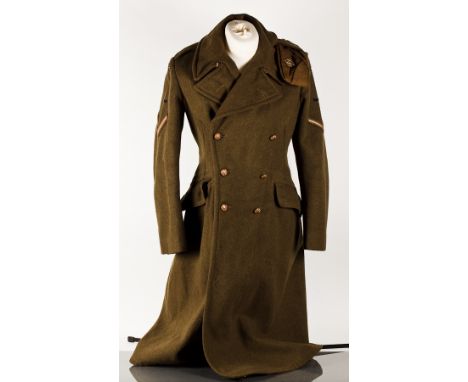 WWII BRITISH ARMY COAT AND A WWII CAP 
the coat in green wool bearing patches to both arms, the interior labelled 'Colin Camp