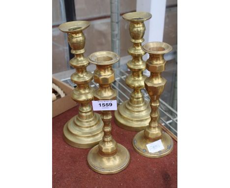 TWO PAIRS OF VINTAGE BRASS CANDLE STICKS 