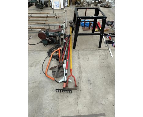 AN ASSORTMENT OF ITEMS TO INCLUDE A METAL BASE, A CLARKE BELT SANDER AND AN ELECTRIC LONG REACH CHAINSAW ETC 
