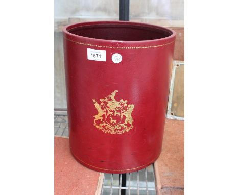 A VINTAGE RED LEATHER BOUND UMBRELLA/STICK STAND WITH EMBOSED COAT OF ARMS 