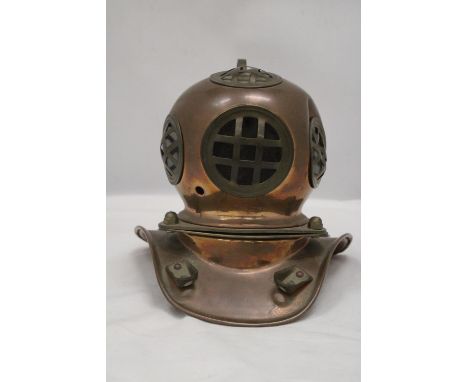 A VINTAGE COPPER AND BRASS DIVERS HELMET 