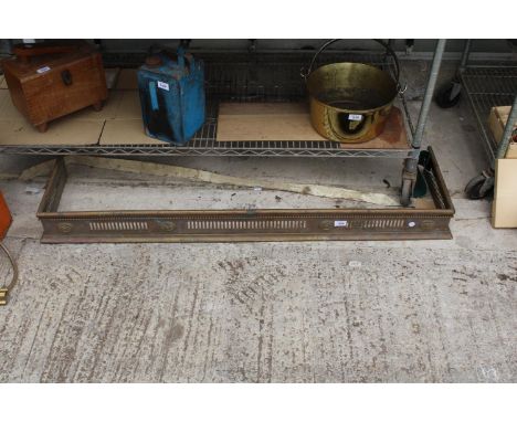 A VINTAGE BRASS FIRE FENDER 