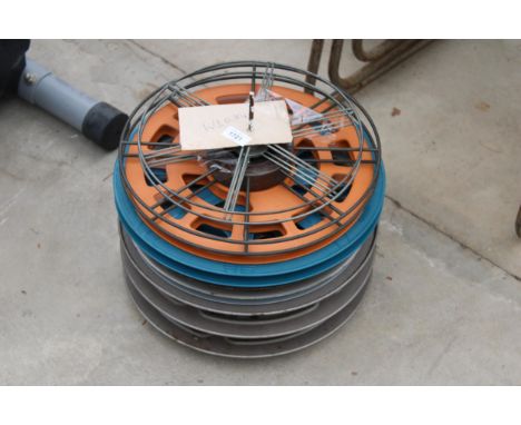AN ASSORTMENT OF VINTAGE FILM REELS 