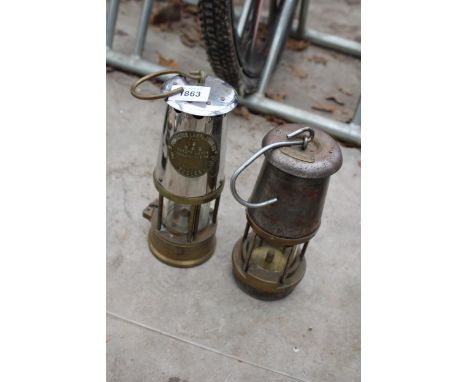 A VINTAGE WOLF SAFETY LAMP AND A FURTHER PROTECTOR LAMP 
