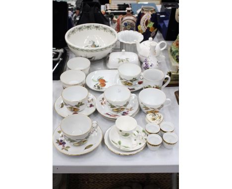 A QUANTITY OF ROYAL WORCESTER 'EVESHAM' CERAMICS TO INCLUDE LARGE CUPS AND SAUCERS, A BUTTER DISH, RAMEKINS, ETC, PLUS A LARG